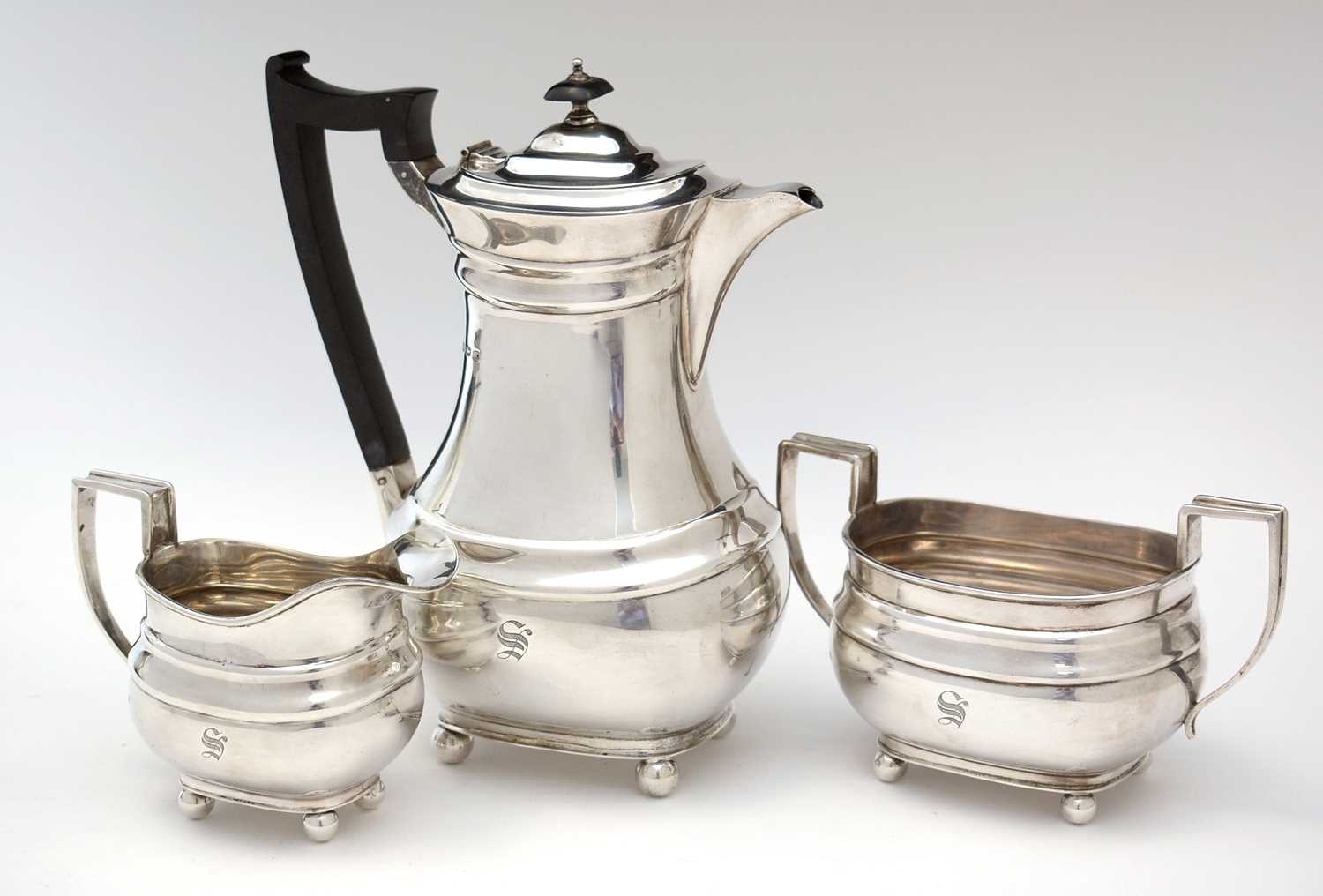 Lot 195 - Silver matching hot water jug, milk jug and two-handled sugar bowl