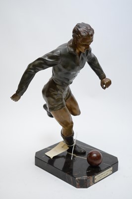 Lot 439 - A cast spelter football figure