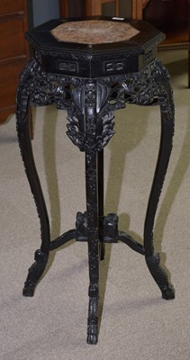 Lot 884 - Chinese carved hardwood octagonal jardiniere stand.