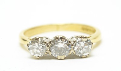 Lot 95 - A three-stone diamond ring.