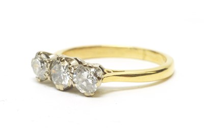 Lot 95 - A three-stone diamond ring.