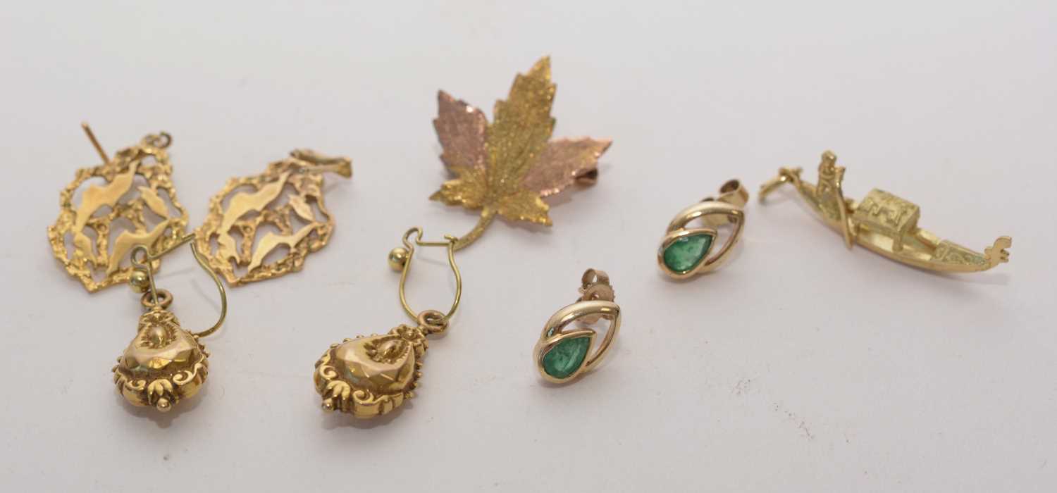 Lot 155 - Gold earrings, brooch and charm