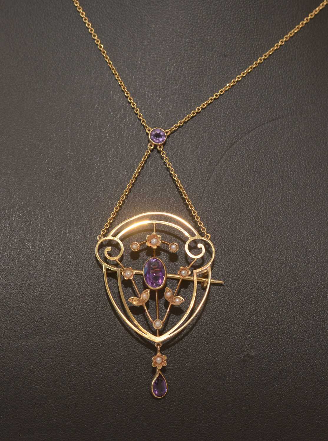 Lot 161 - Edwardian amethyst and seed pearl pendant