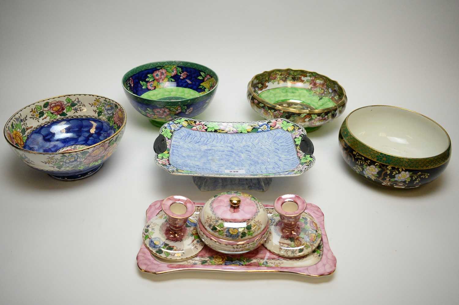 Lot 230 - Maling Lustreware including bows, cake dish and dressing table set