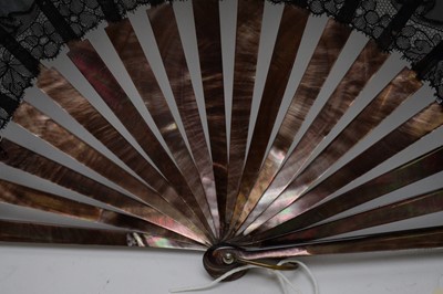 Lot 383 - Continental black silk fan; and a letter opener.