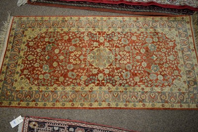 Lot 138 - A Persian silk carpet