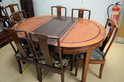 Lot 142 - Chinese mahogany extending dining table; and eight chairs (two carvers).
