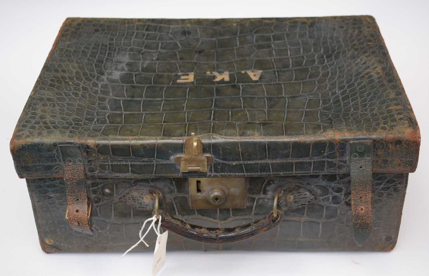 Lot 182 - Victorian green leather travelling case and contents.