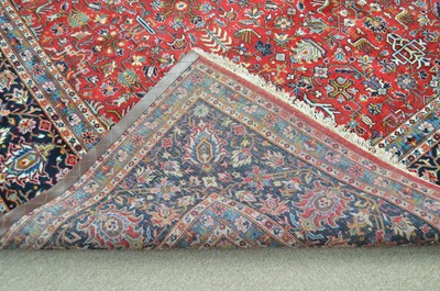 Lot 638 - A fine signed Kashan carpet