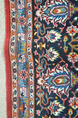Lot 638 - A fine signed Kashan carpet