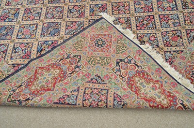Lot 648 - Antique Kirman carpet