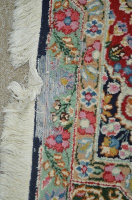 Lot 648 - Antique Kirman carpet