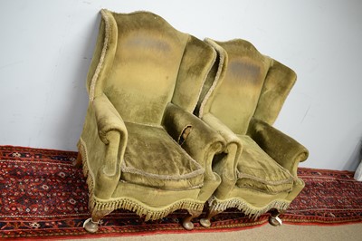 Lot 63 - Pair of early 20th C wing back armchairs.