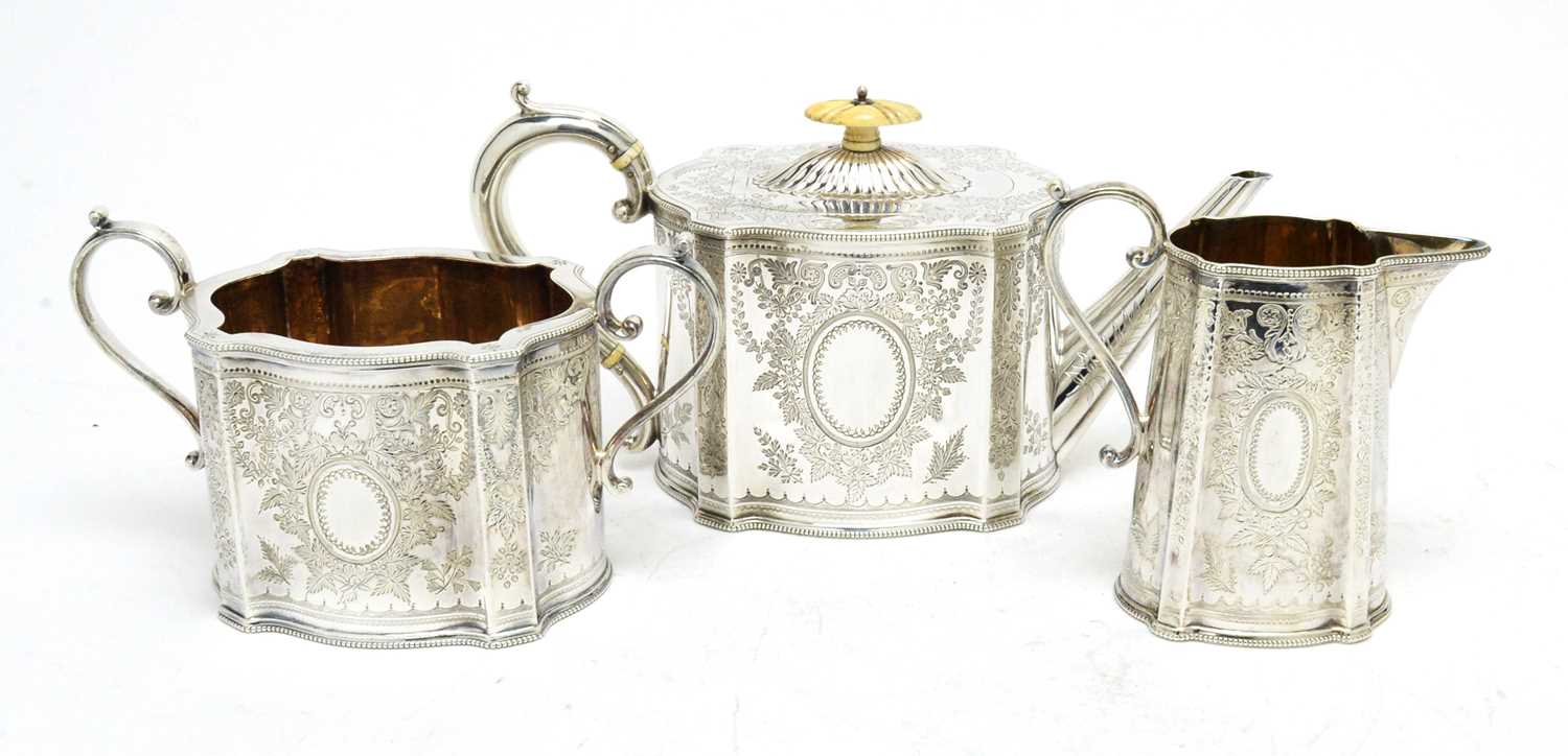 Lot 158 - A Victorian silver three-piece tea service.