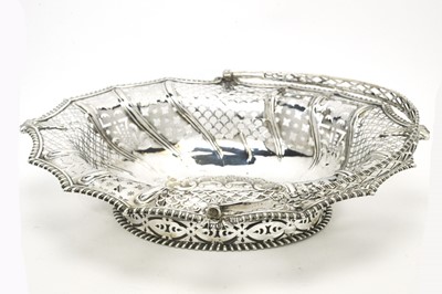 Lot 146 - A George III silver basket.
