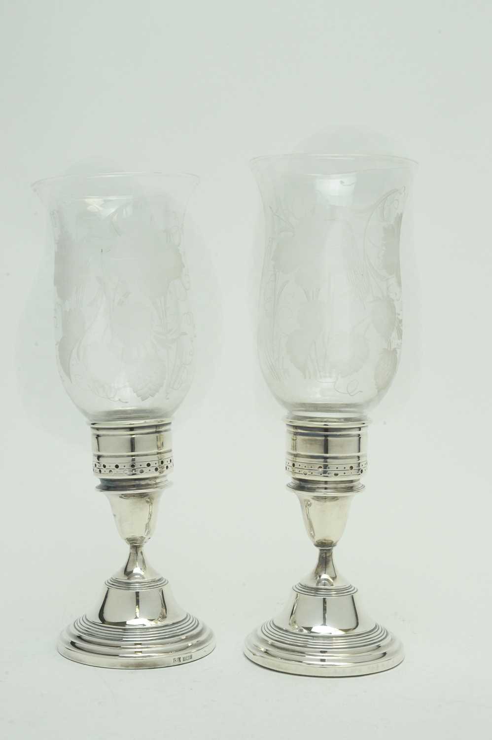 Lot 188 - A pair of Elizabeth II silver candlesticks.
