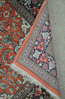 Lot 635 - A modern silk Persian rug.