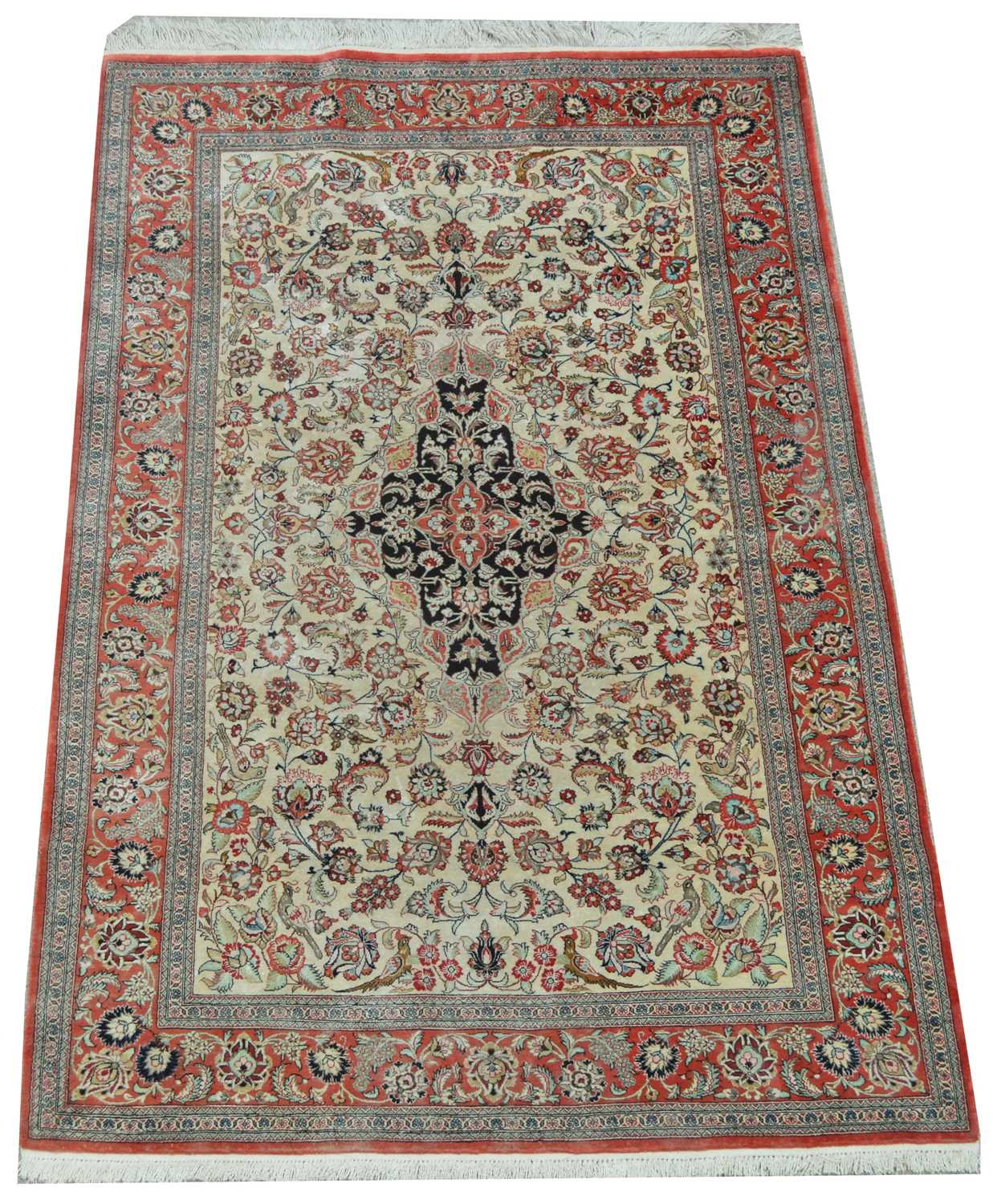 Lot 636 - A modern Persian silk rug.