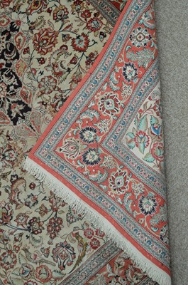 Lot 636 - A modern Persian silk rug.