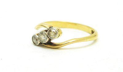 Lot 108 - A three-stone diamond ring.