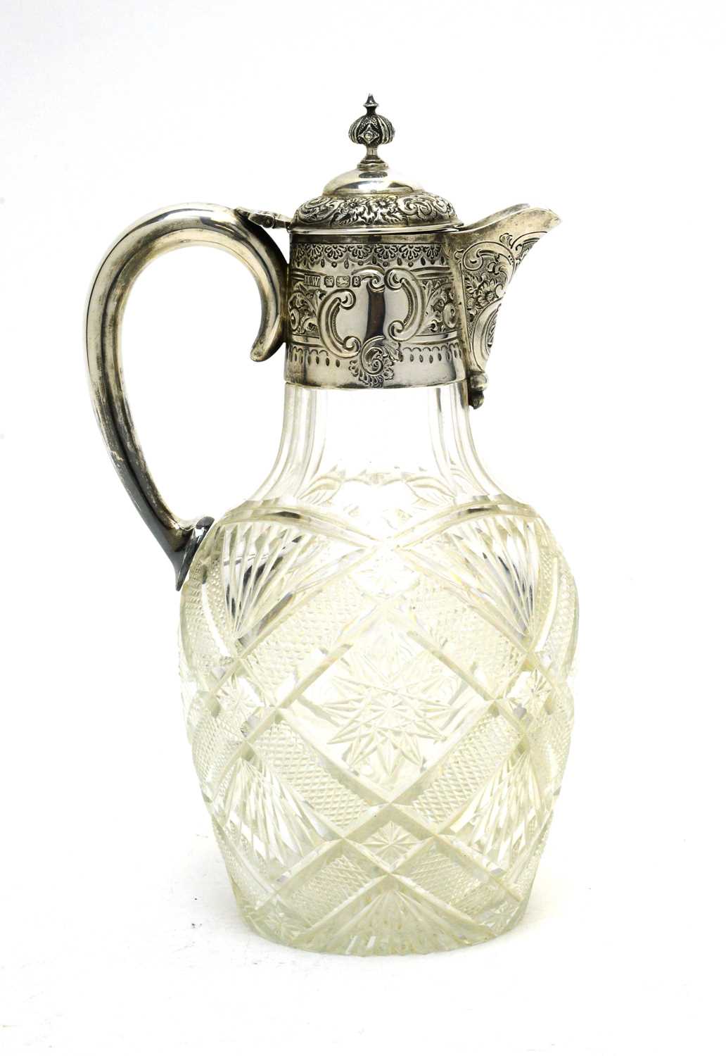 Lot 173 - Silver mounted cut glass claret jug