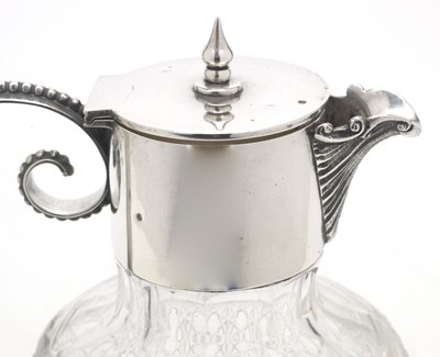 Lot 159 - Silver mounted cut glass claret jug