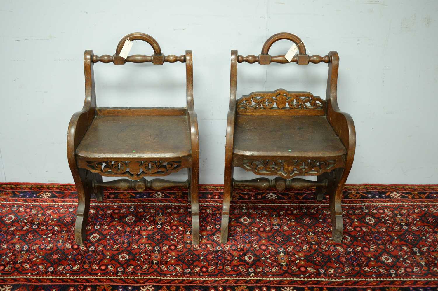Lot 47 - A pair of 19th Century oak hall chairs