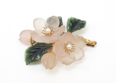 Lot 60 - A mid 20th C Austrian carved quartz and nephrite floral pattern brooch and earrings.
