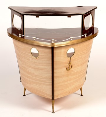 Lot 861 - Umberto Mascagni, Bologne, Italy: a mid 20th Century boat form cocktail bar.