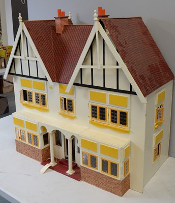 Lot 964 - A two-storey half-timbered doll's townhouse.