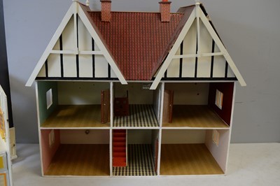 Lot 964 - A two-storey half-timbered doll's townhouse.