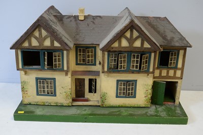 Lot 955 - A Tri-ang doll's house