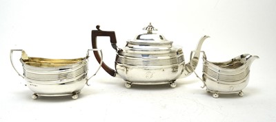 Lot 174 - George III silver three piece tea service