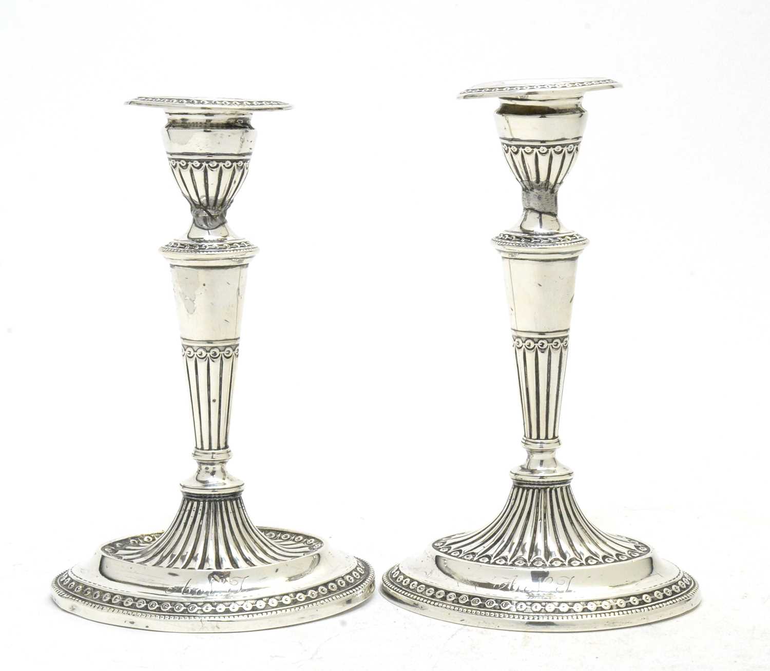 Lot 176 - A pair of Victorian silver candlesticks
