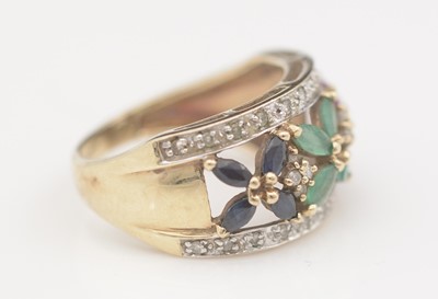 Lot 311 - A gem-set dress ring.