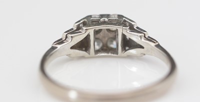 Lot 312 - A diamond dress ring.