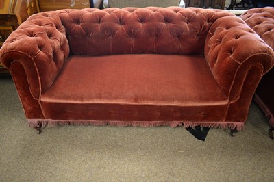 Lot 74 - Pair of late Victorian Chesterfield sofas.
