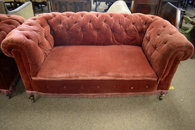 Lot 74 - Pair of late Victorian Chesterfield sofas.
