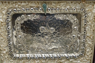 Lot 136 - An Edwardian cased silver dressing table set