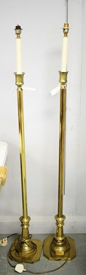 Lot 282 - A pair of brass lamp standard