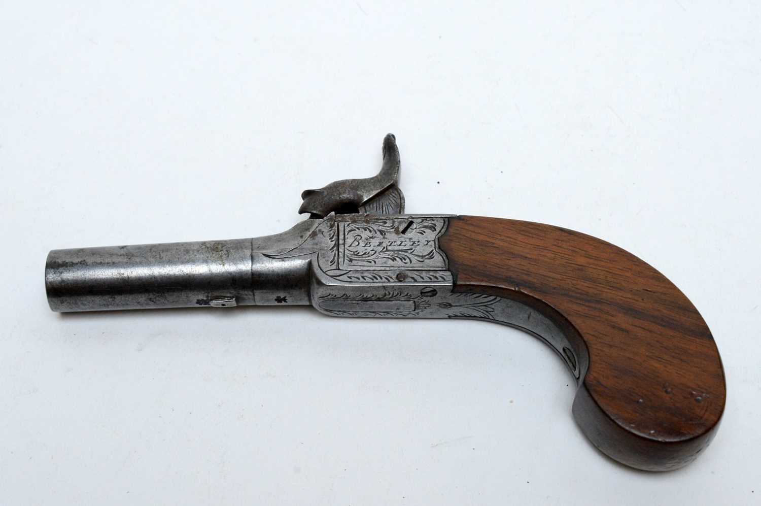 Lot 1081 - An early 19th Century percussion pocket pistol by Bentley of London.