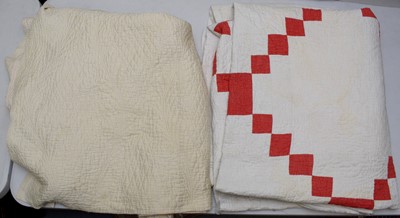 Lot 317 - Two Durham quilts, one with red patched decoration.