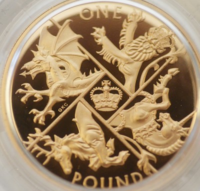 Lot 20 - The Last 'Round Pound', issued by The Royal Mint in 2016 as a £1 22ct gold proof coin