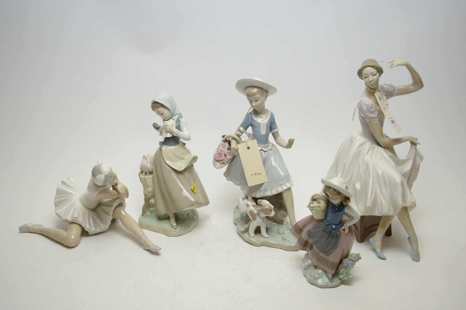 Lot 409 - Five Lladro porcelain figures.