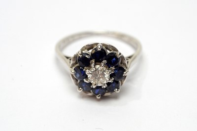 Lot 35 - A sapphire and diamond cluster ring