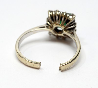 Lot 36 - An emerald and diamond ring