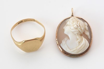 Lot 295 - 18ct. yellow gold signet ring; and a carved shell Cameo.