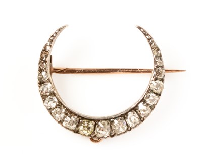 Lot 112 - A Victorian diamond crescent brooch