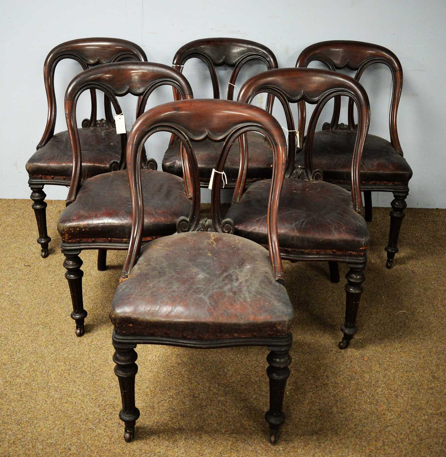 Lot 49 - A set of six Victorian mahogany spoon back dining chairs