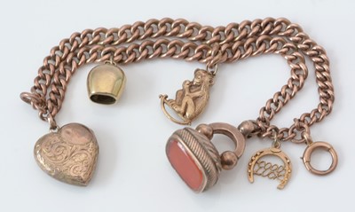 Lot 273 - 9ct. rose gold charm bracelet.